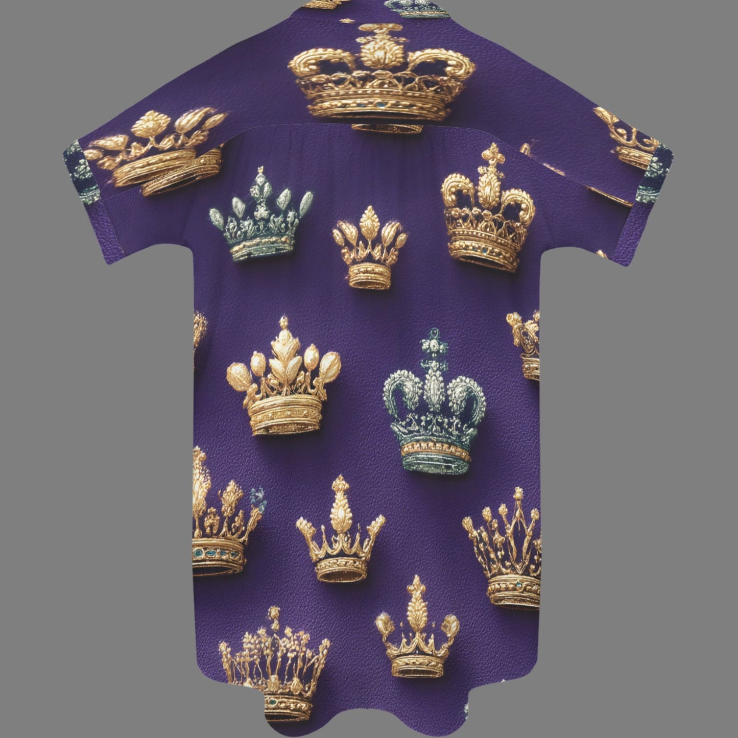A purple short-sleeve t-shirt with an all-over print of various golden and teal crowns, displayed against a solid gray background.