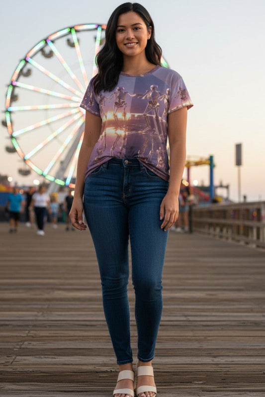 Woman standing on a boardwalk with a Ferris wheel in the background