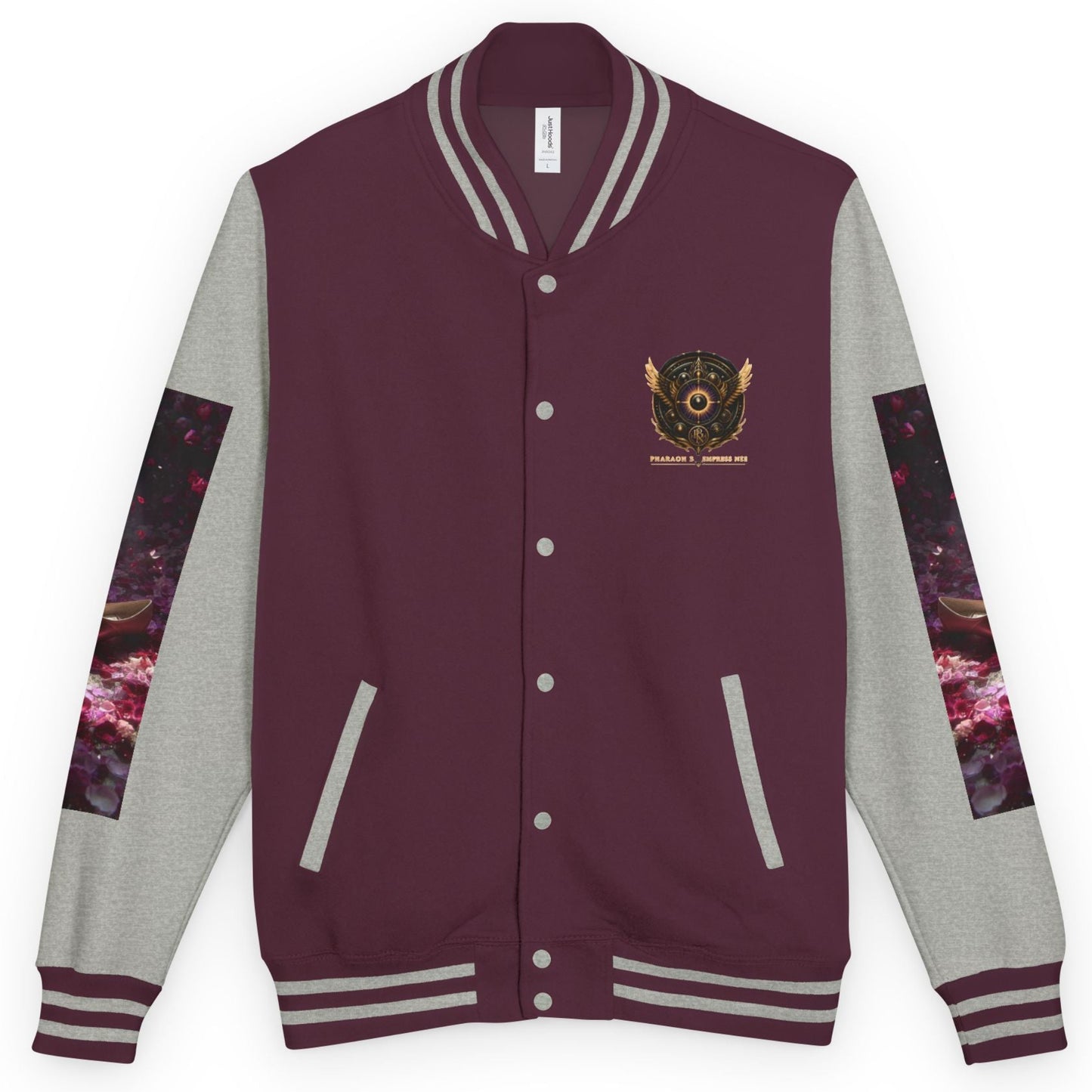 A varsity-style jacket with a burgundy body, light gray sleeves, and a colorful cosmic-themed graphic print on the upper sleeves. The jacket features a central crest patch on the left chest and is displayed against a solid white background.