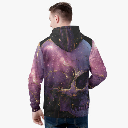 A man viewed from the back wearing a hooded zip-up jacket with a purple and black skull design accented by gold glitter-like details, set against a plain light gray background.