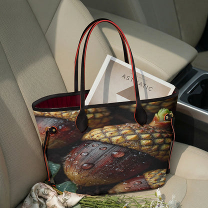 A tote bag with a realistic acorn print sits on a beige car seat. The bag features dark brown and black acorns with water droplets, a red interior lining, and red trim on the handles.