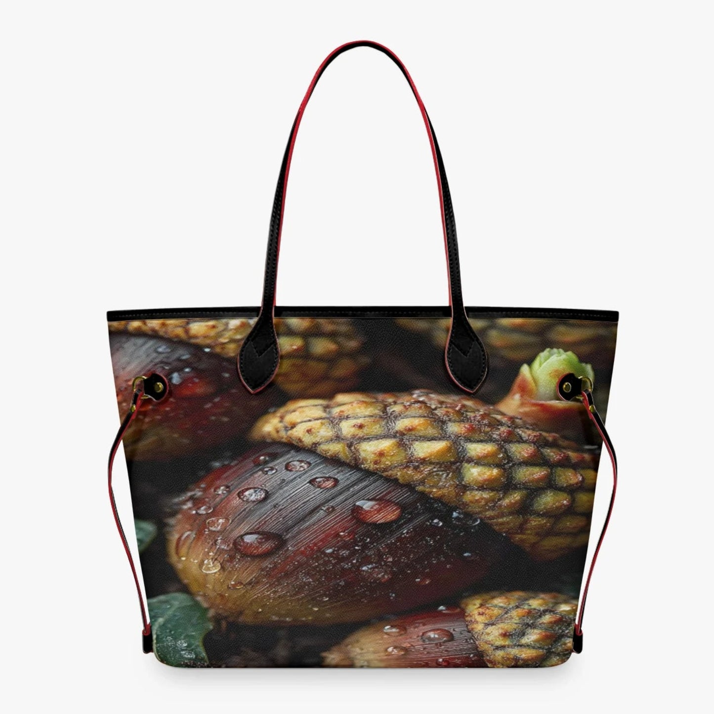 A tote bag featuring a detailed photographic print of wet acorns with water droplets, complete with dark brown leather handles and side straps, shown against a plain light gray background.