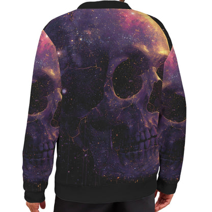 A man viewed from the back wearing a black bomber-style jacket with an all-over cosmic skull print in purple, pink, orange, and black on a white studio background.