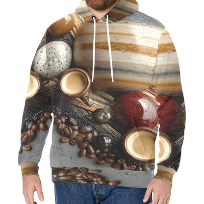 A man wearing a pullover hoodie with an all-over coffee-themed print featuring coffee cups, coffee beans, and a striped background, paired with blue jeans against a plain white background.
