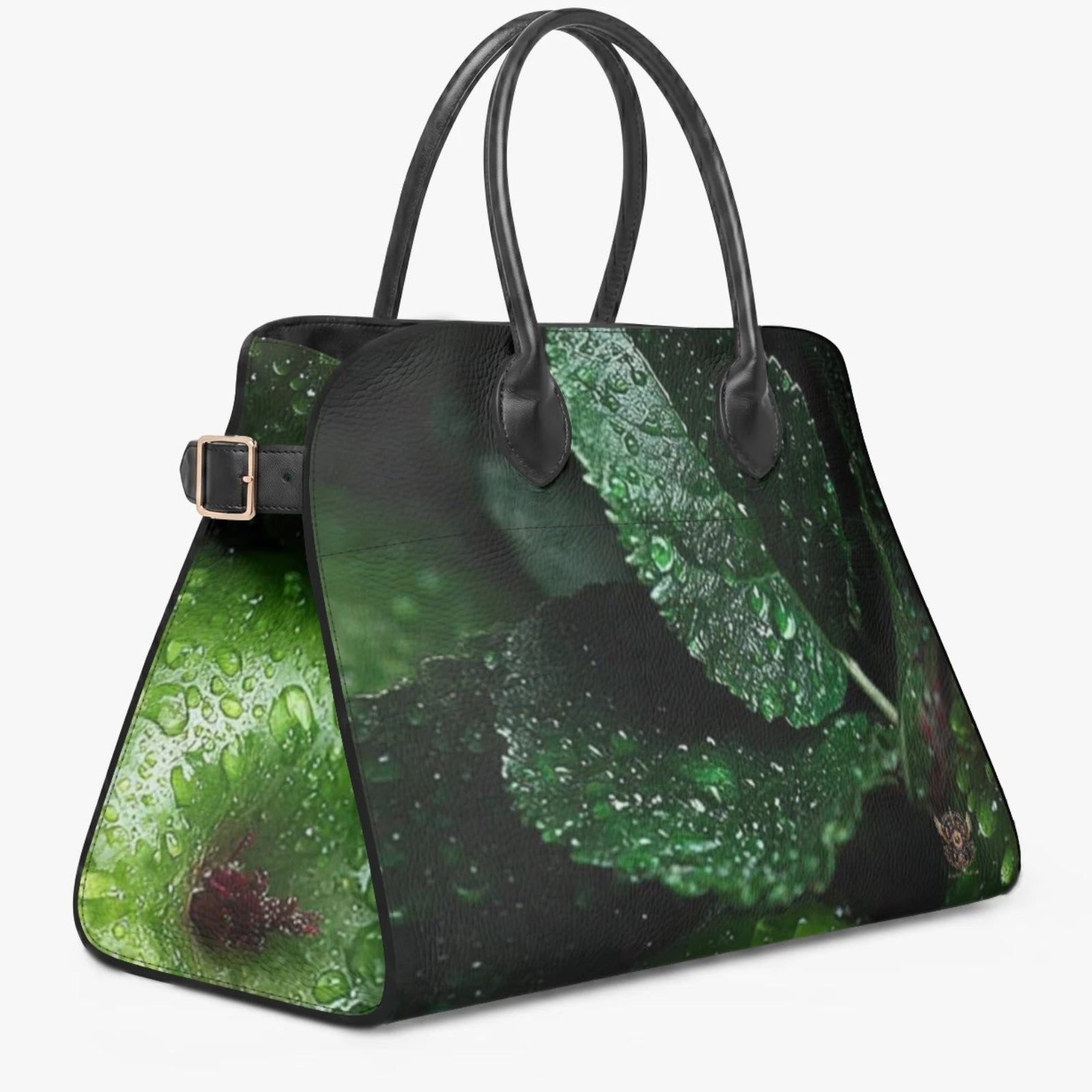 A structured handbag with a glossy green leaf print and black handles, shown on a light gray background.