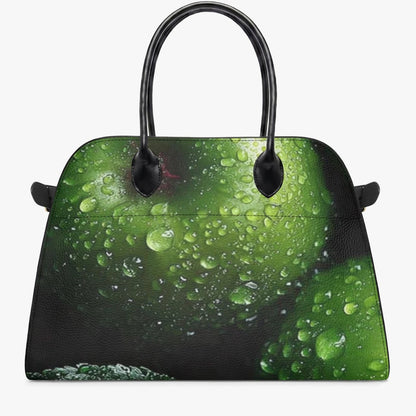 A structured handbag with a glossy green and black print featuring water droplets, complete with black double top handles, shown against a plain white background.