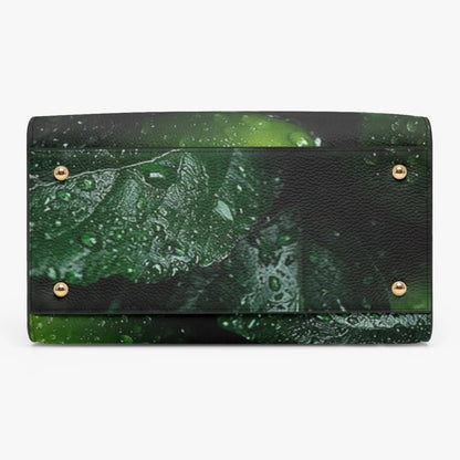 A green and black textured wallet with a water droplet leaf print and small gold-tone metal rivets, shown on a plain white background.
