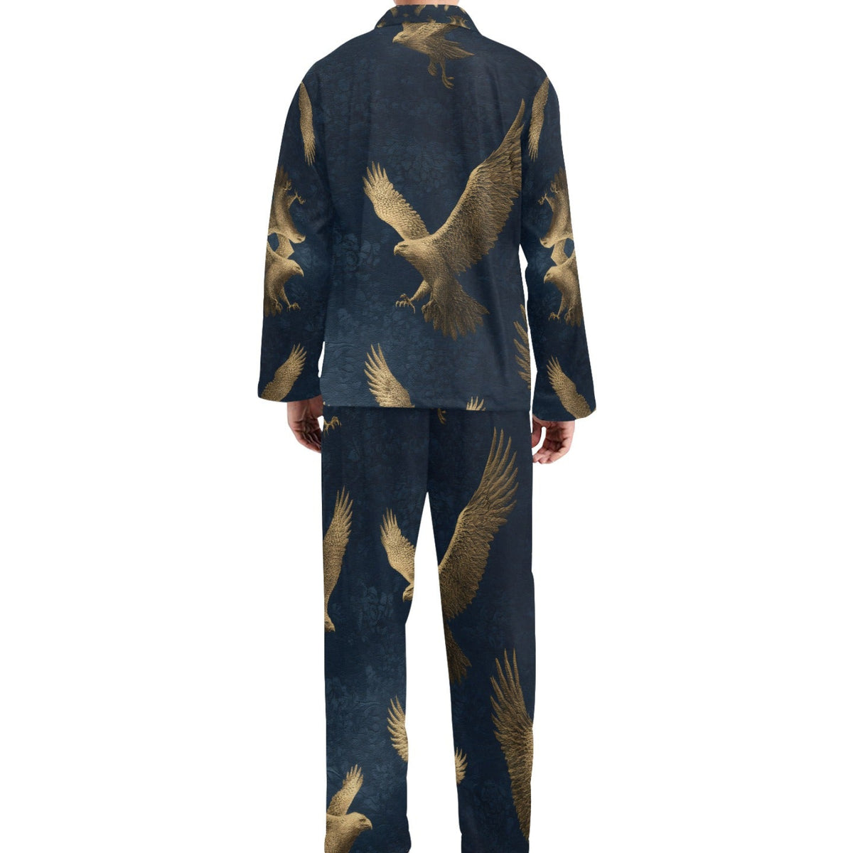 A man viewed from the back wearing a matching two-piece pajama set with a dark navy blue background and a repeating pattern of golden-brown flying eagles, set against a plain white background.