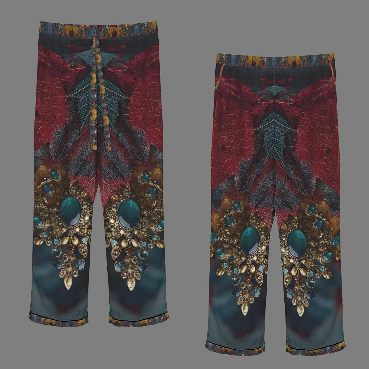 A pair of cropped wide-leg pants shown from the front and back on a flat gray background. The pants feature a highly detailed, symmetrical fantasy print with deep red wings, dark teal feathers, and large ornate gold and turquoise jewel motifs near the lower legs.