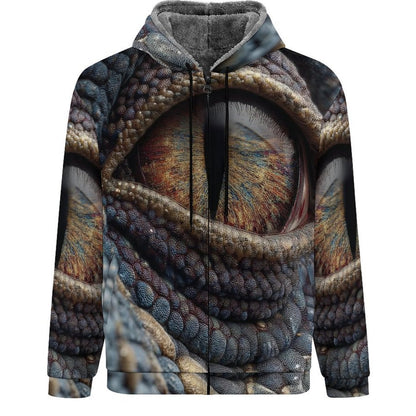 A zip-up hoodie featuring an all-over 3D print of a reptile eye and textured scales, with a gray sherpa-lined hood and black zipper, shown on a plain white background.