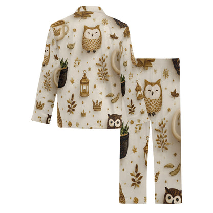 A two-piece pajama set featuring a long-sleeve top and matching pants with an all-over print of owls, lanterns, leaves, and gold crowns on a cream background.