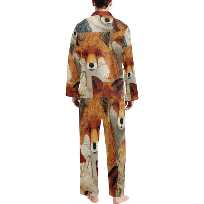 A person shown from the back wearing a matching long-sleeve pajama top and pants set with an all-over fox face print. The print features orange, brown, cream, black, and white fox faces and ears.