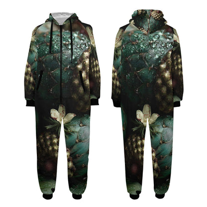 Front and back views of a full-length hooded jumpsuit featuring an all-over abstract print in dark teal, black, and gold tones with floral motifs, shown on a plain white background.
