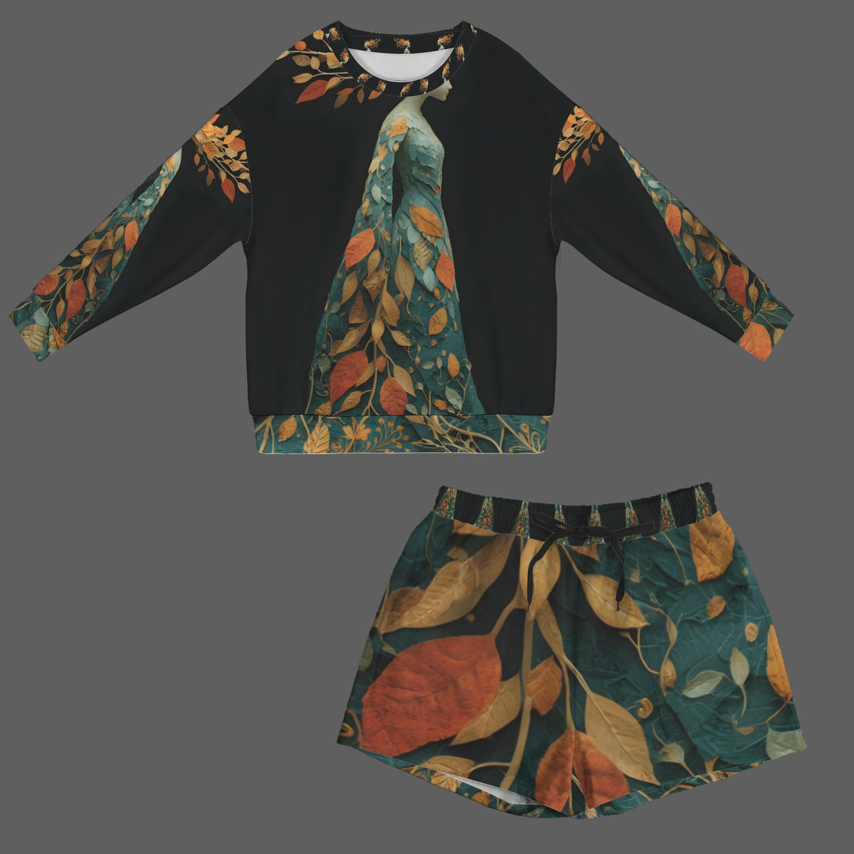 A two-piece women's lounge set consisting of a long-sleeve cropped sweatshirt and matching shorts, featuring a dark teal and black base with a large, painterly leaf pattern in rust orange, gold, and olive green.