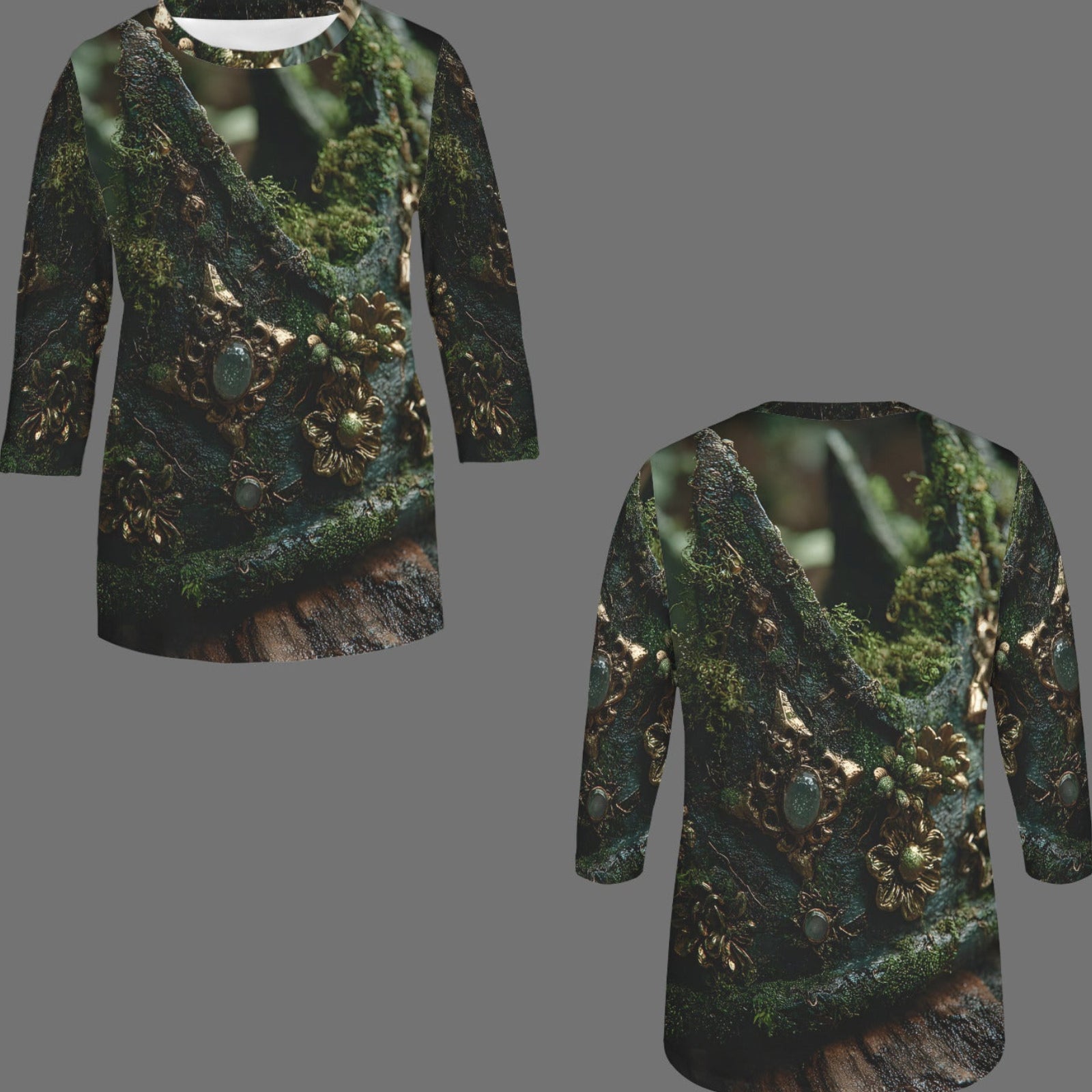 Front and back views of a long-sleeve tunic top featuring an all-over print of mossy green branches and gold floral details on a dark background, displayed against a solid gray backdrop.