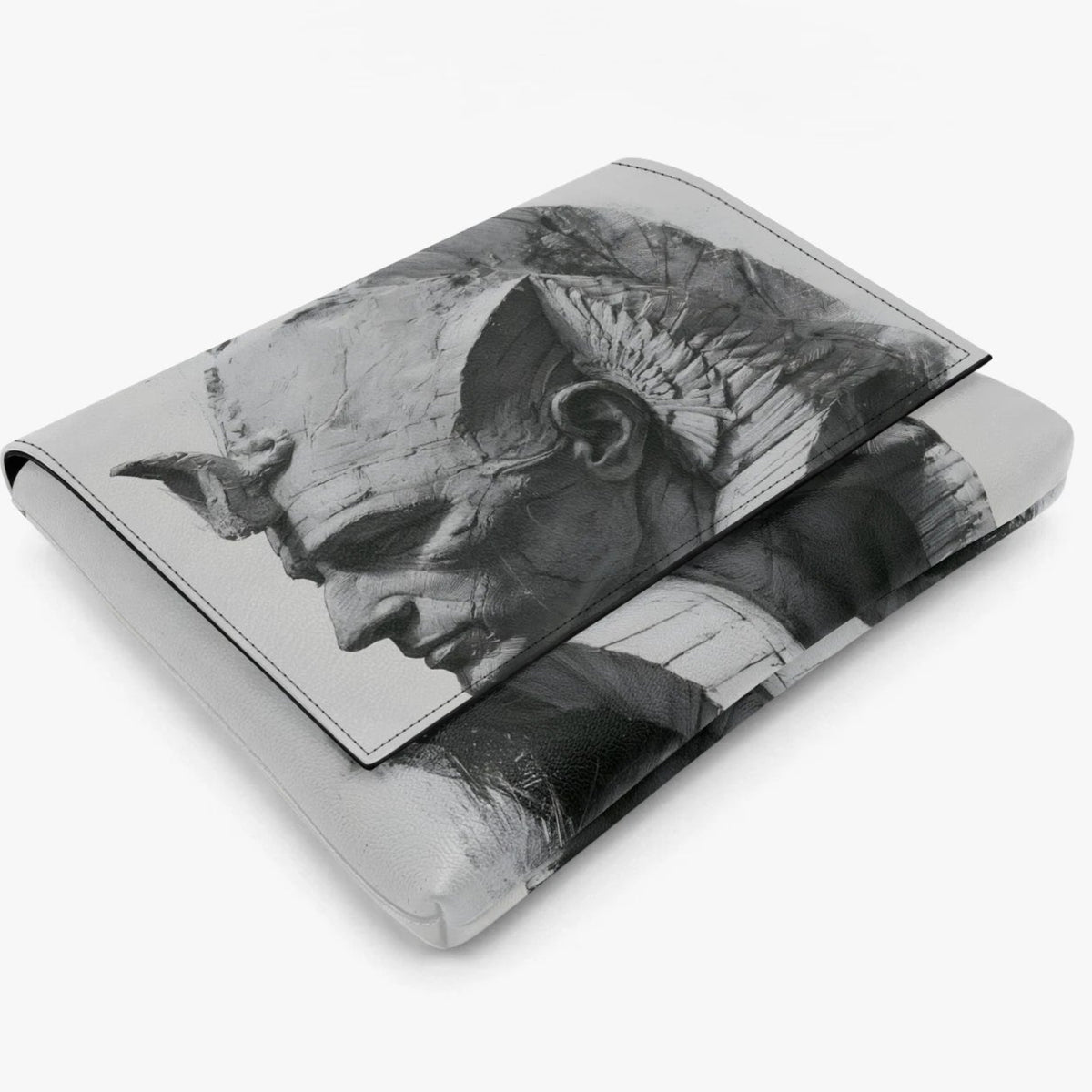 A black and white leather laptop sleeve featuring a detailed sketch-style print of a horned figure, shown on a clean white background.