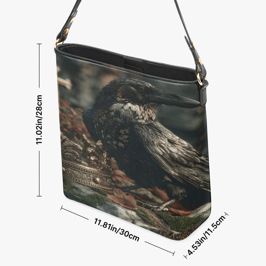 A shoulder bag with a printed kookaburra bird design, shown with black dimension lines and text indicating its height of 11.02 in (28 cm) and width of 11.