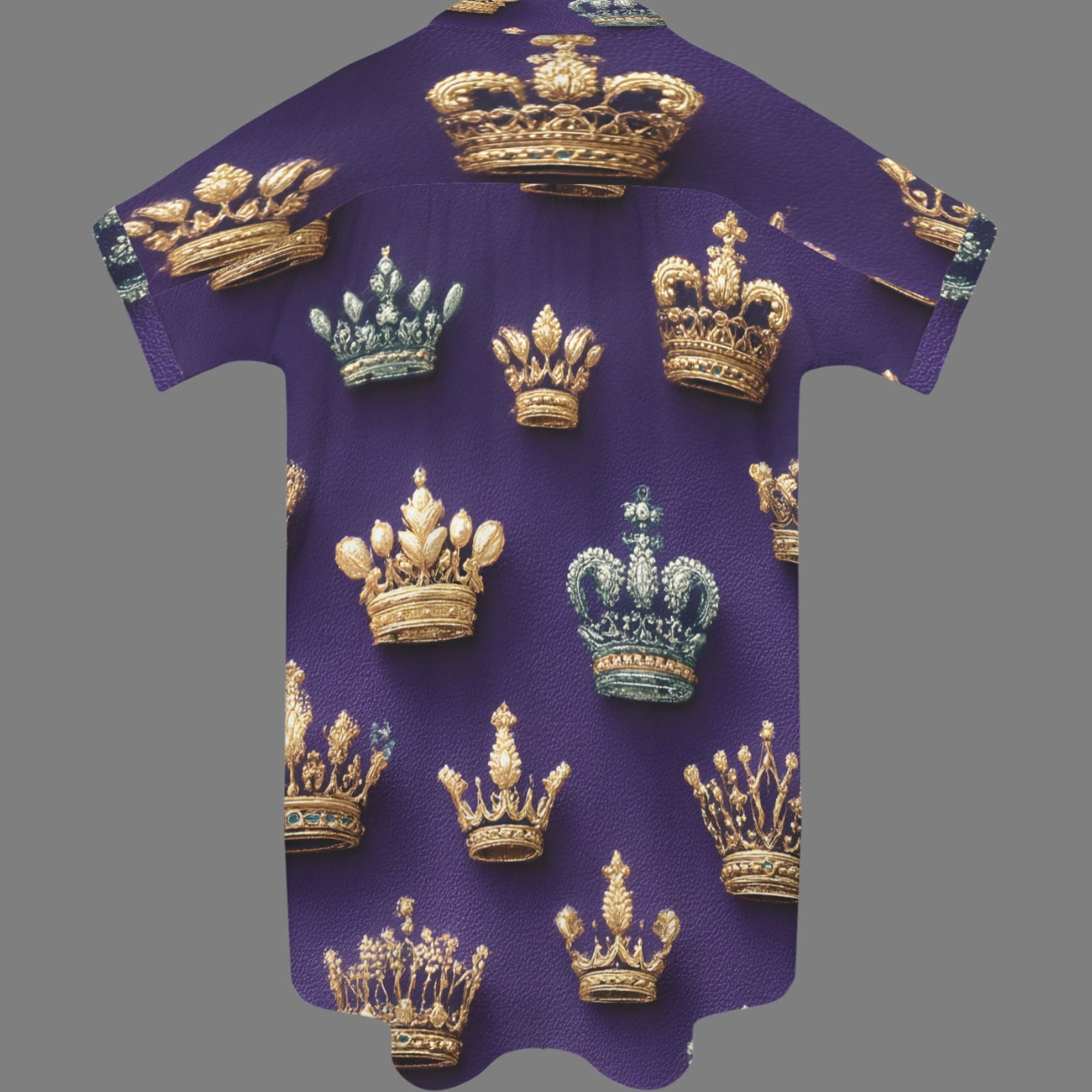A purple short-sleeve t-shirt with an all-over print of various golden and teal crowns, displayed against a solid gray background.
