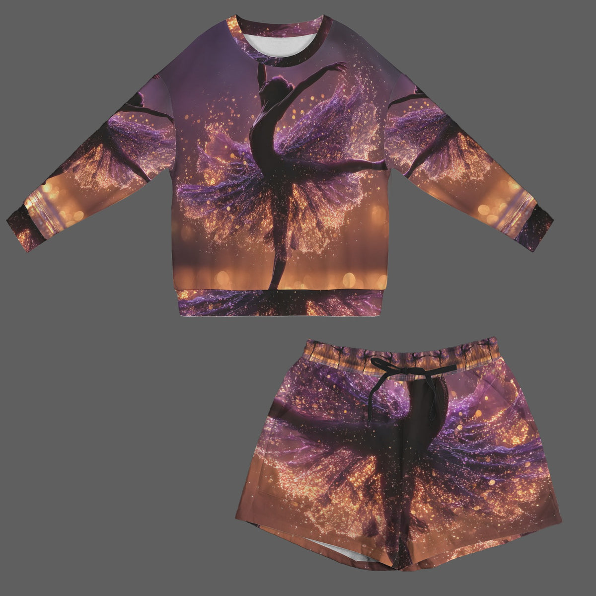 A matching two-piece outfit set consisting of a long-sleeve crewneck sweatshirt and shorts, both featuring an all-over print of a ballerina silhouette against a purple and gold glittery background.
