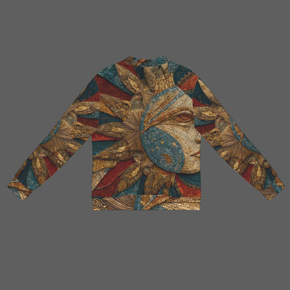 A long-sleeve cropped jacket featuring an intricate Art Deco style print with a stylized face, gold leaf textures, and geometric shapes in gold, teal, red, and brown on a solid dark gray background.