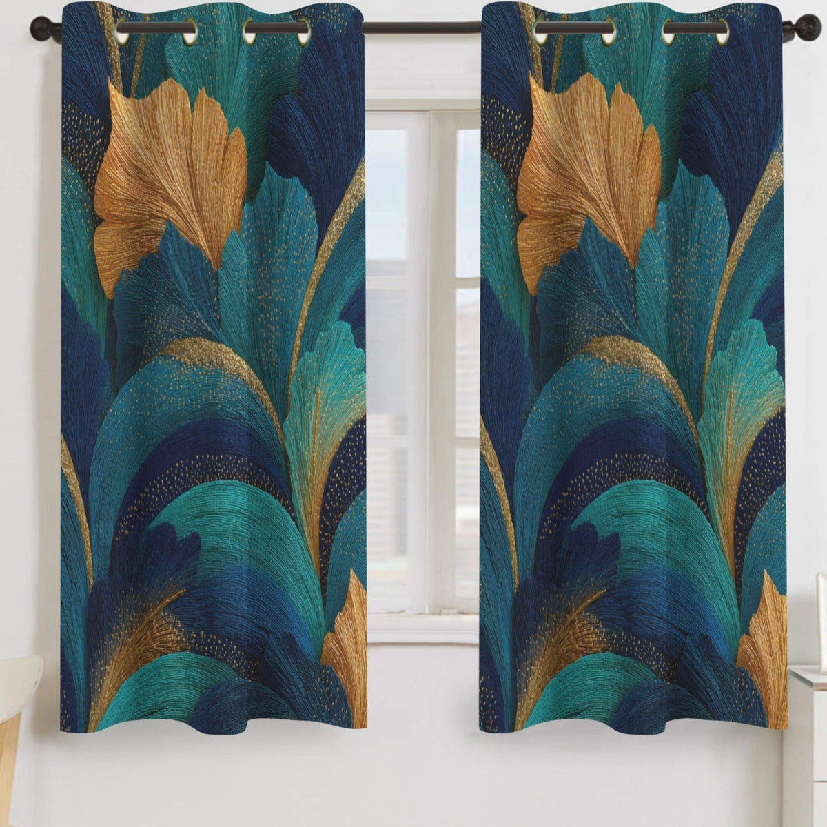 A pair of grommet-top curtain panels hanging on a dark rod in front of a window. The curtains feature an abstract botanical pattern with layered leaves in deep teal, turquoise, navy, and metallic gold.