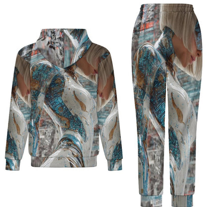 A matching two-piece tracksuit set featuring a pullover hoodie and jogger pants, both printed with an abstract, stylized graphic design in shades of blue, gray, white, and brown.