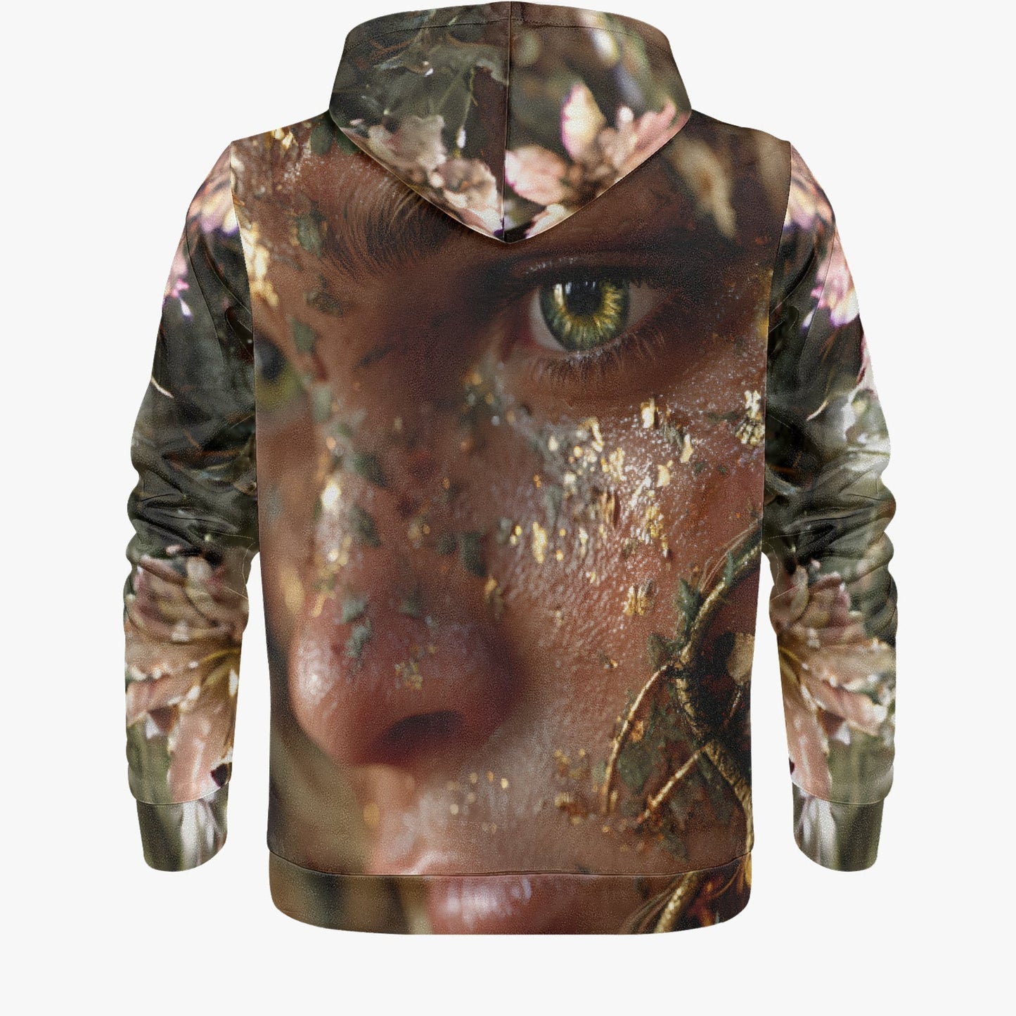 A pullover hoodie shown from the back, featuring an all-over photographic print of a close-up human face with a green eye, overlaid with a camouflage pattern and pink floral elements, on a light gray background.