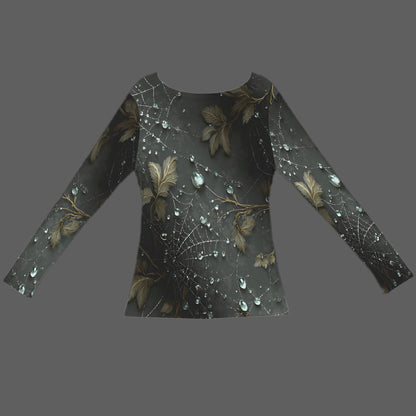 A long-sleeve top with a dark gray and black base featuring a detailed print of spiderwebs, gold-toned leaves, and clear water droplets, shown against a solid dark gray background.