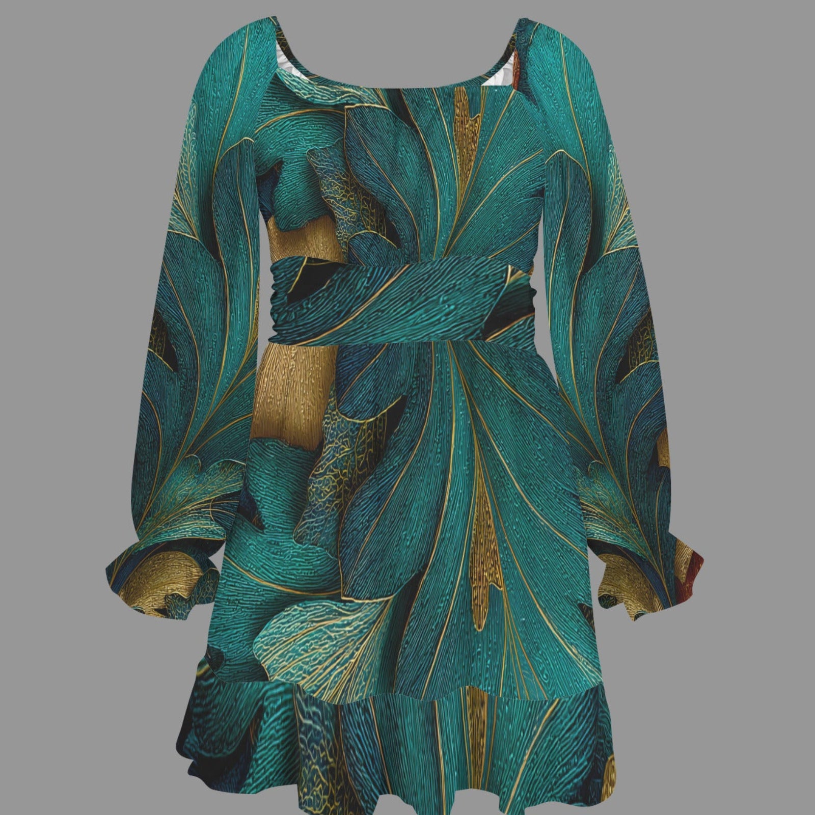 A long-sleeve mini dress with a wide scoop neckline, featuring an abstract leaf-like pattern in teal, green, and gold, shown against a solid gray background.