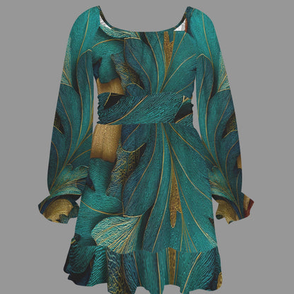 A long-sleeve mini dress with a wide scoop neckline, featuring an abstract leaf-like pattern in teal, green, and gold, shown against a solid gray background.